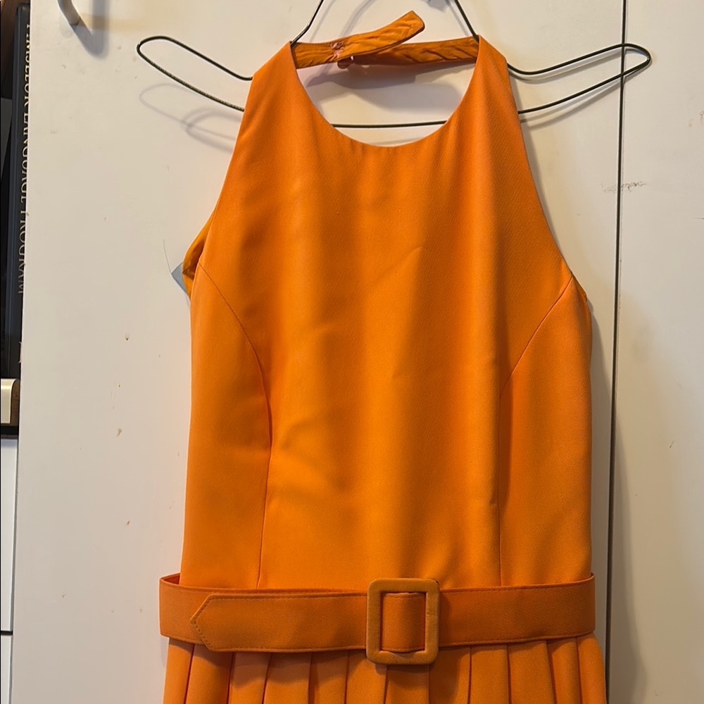 Bill Blass halter styleOrange Sleeveless dress with pleaded flare skirt bottom